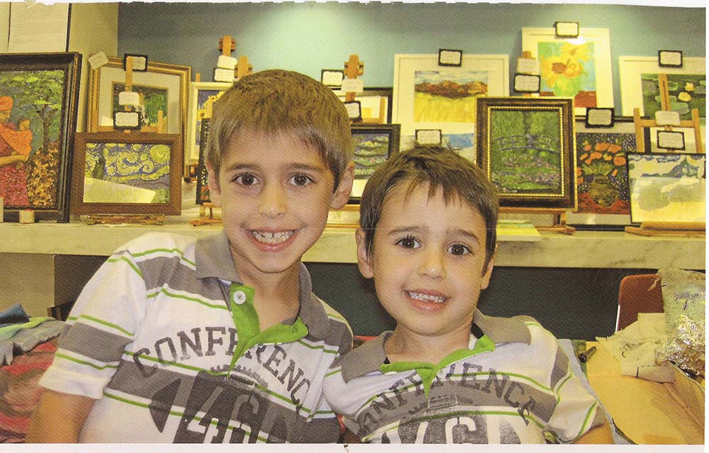 Dante and Gianni display their paintings to raise money for U.N.I.C.E.F. and A.I.M.